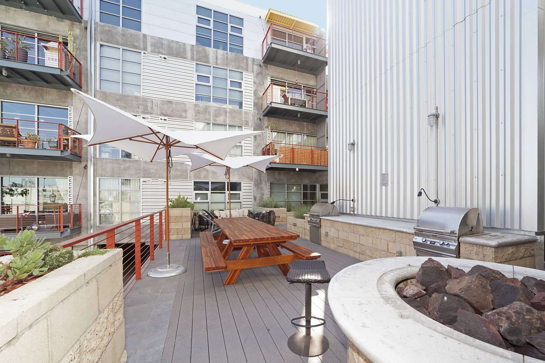  The complex features include a fitness center, gated parking garage, a large bicycle storage room, and an outdoor courtyard with gas grills, fire pit and comfortable furniture for lounging with friends. 