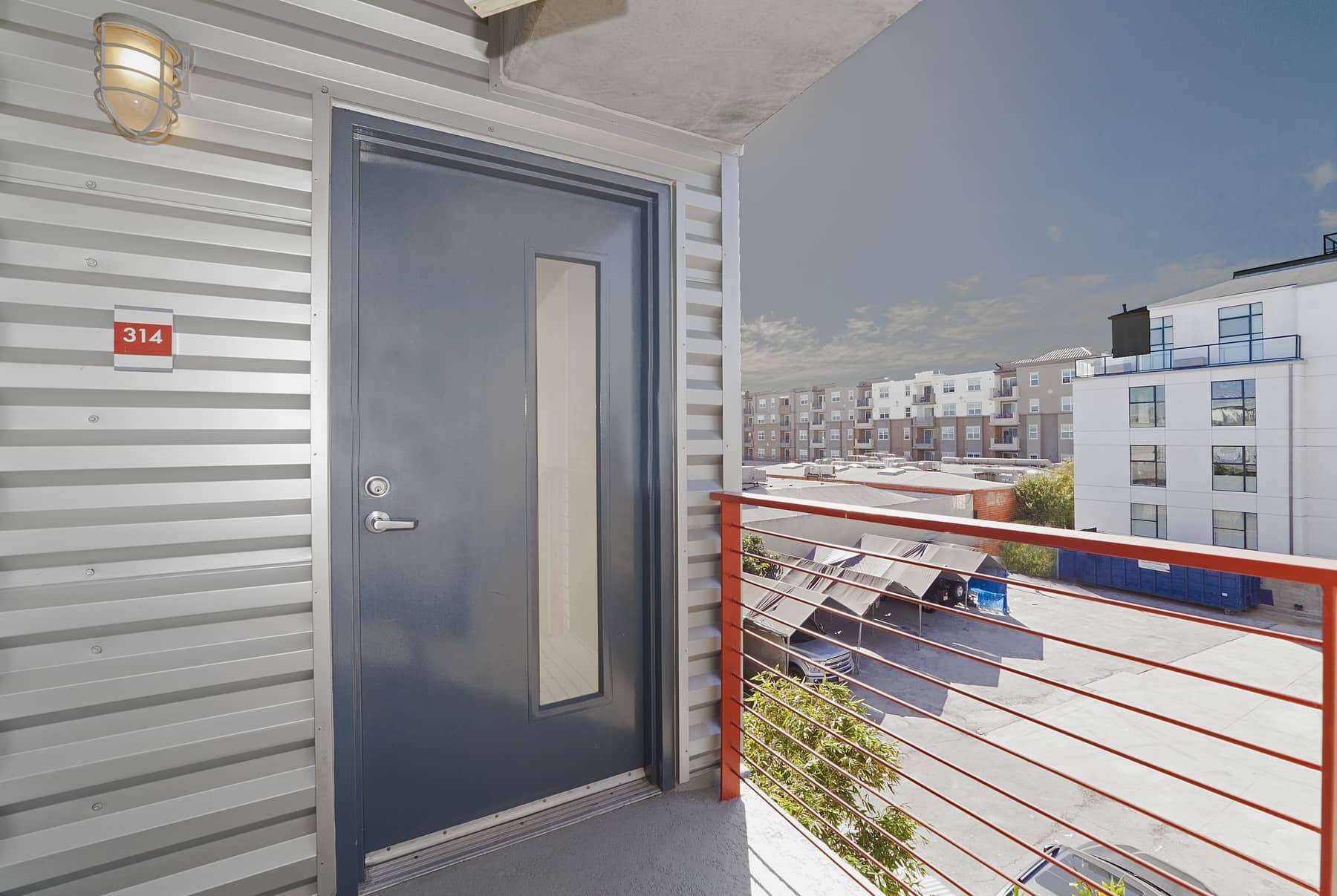  As you might expect based on the appearance of the exterior construction, each unit is accessed via a secure, heavy-duty steel door. And, of course, style is not to be overlooked here either. A vertical, frosted pane of glass assigns a modern elegan