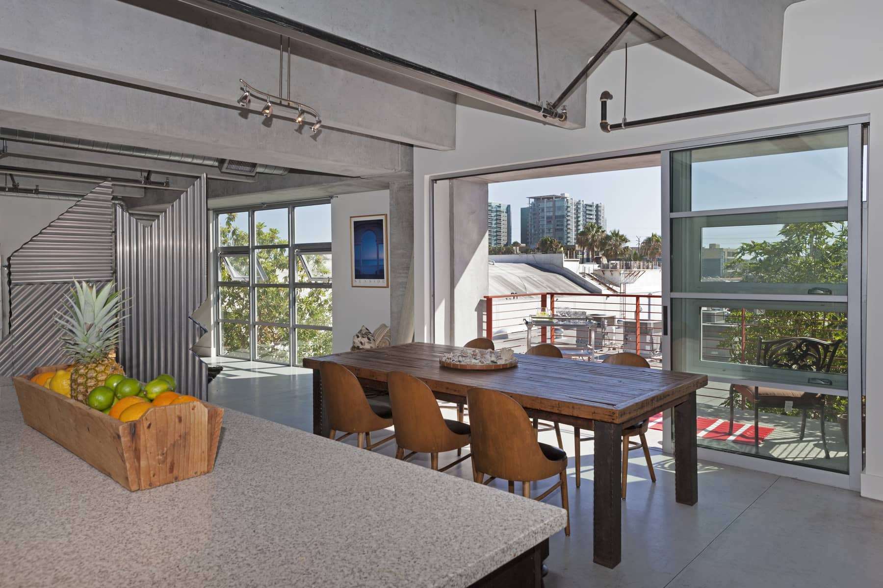  Space and light. That’s what this home’s interior is all about. And thanks to the location of this west-facing end-unit, you’ll enjoy the beautiful glow of magic hour filling your home every day as the sun recedes over the horizon, just beyond your 